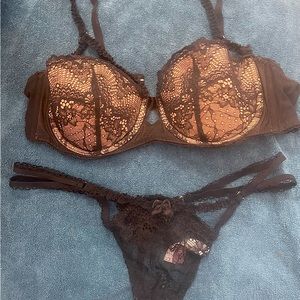 Black and tan 'Adore Me' bra and panty set.